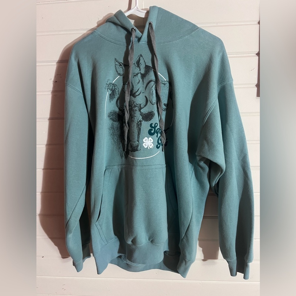 Greenish colored hoodie